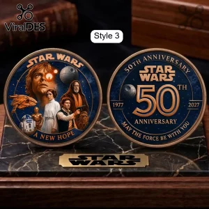 Star Wars 50th Anniversary Commemorative Gold Coin showing character portraits and the 50th anniversary logo.