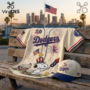 Off-white Los Angeles Dodgers baseball jersey and matching cap with Snoopy, American flags, and firework graphic patterns.!