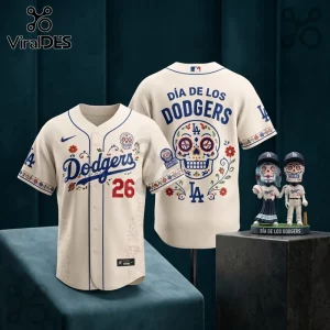 Los Angeles Dodgers Dia De Los Muertos cream baseball jersey featuring sugar skull graphics and floral patterns.