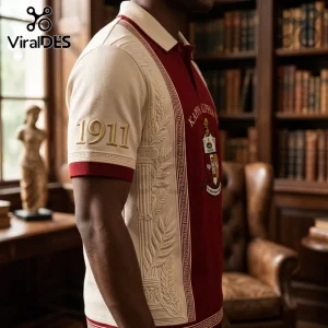 Kappa Alpha Psi polo shirt featuring crimson and cream fabric, 1911 embroidery on sleeve, and Greek column design elements.!