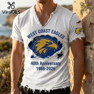 White V-neck t-shirt with distressed edges featuring West Coast Eagles logo and 40th Anniversary text, 1986-2026.!