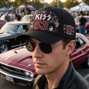KISS Band 53 Years Anniversary black baseball cap with band member graphics, red 53 lettering, and US flag detail.