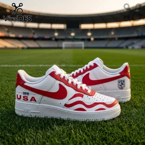 White and red leather sneakers featuring USA branding, wavy graphic patterns, and a soccer stadium background.!