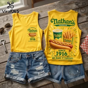 Nathan's Famous Since 1916 V-Neck Tank Top in yellow featuring hot dog, fries, and beverage graphics on wooden surface.