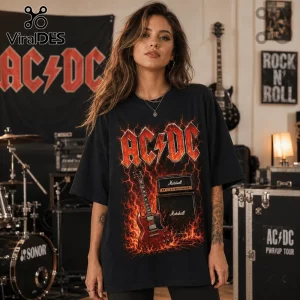 Vintage AC/DC I May Be Old Band T-Shirt featuring a red guitar and fire graphic on a black oversized cotton fabric.