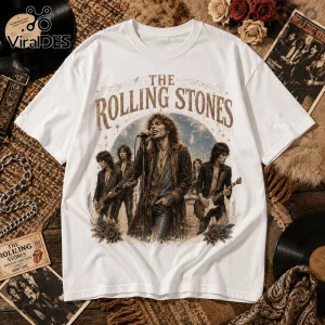 White crewneck t-shirt featuring a vintage-style Rolling Stones band illustration with guitars, roses, and star graphics.!