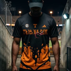 Black and orange Tennessee Volunteers athletic t-shirt with SEC and Adidas logos and a paint drip pattern design.!