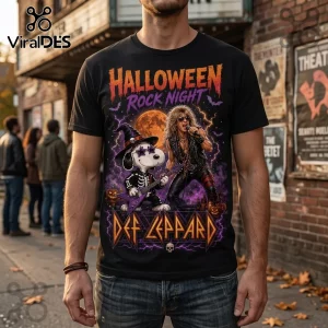 Snoopy x Def Leppard Midnight Howl Halloween T-Shirt features a graphic of Snoopy playing guitar alongside a rock star.