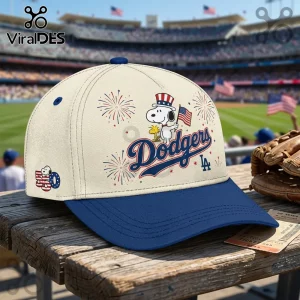 Off-white Los Angeles Dodgers baseball cap featuring Snoopy wearing an Uncle Sam hat holding a US flag with fireworks.!