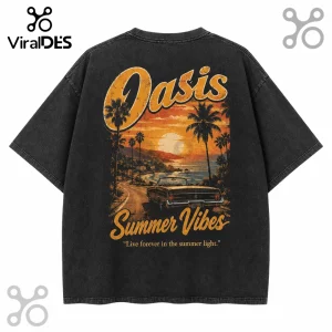 Black vintage-wash t-shirt featuring a sunset coastal scene, a convertible car, palm trees, and text Oasis Summer Vibes.!