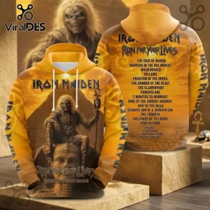 Iron Maiden Run For Your Lives 2026 Tour yellow hoodie featuring Eddie the mascot, pyramids, and a tour song list print.