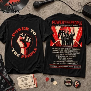Black cotton t-shirt featuring Power to the People graphics, protest fist on front and concert lineup on back.!