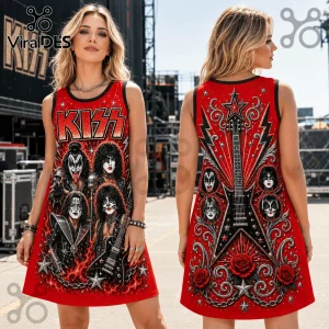 Woman wearing a sleeveless red dress featuring KISS band members, a star-shaped guitar graphic, and red rose accents.!