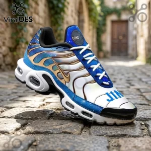 Jin BTS Galaxy Blue Air Max Plus sneakers featuring a white and blue cosmic print, gold accents, and white laces.