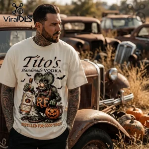 Tito's Vodka Rat Halloween Hot Rod T-Shirt in cream featuring a cartoon rat with a vodka bottle and jack-o'-lantern.