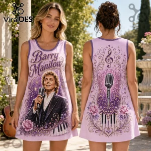 Light purple sleeveless dress featuring Barry Manilow portrait, a microphone, piano keys, and ornate floral patterns.!