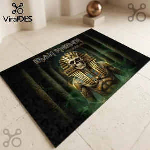 Iron Maiden Powerslave Egyptian Mummy area rug featuring Eddie in a golden sarcophagus against a dark green background.