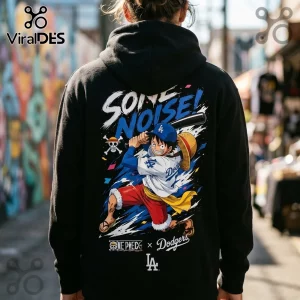 Black hoodie featuring anime character Luffy in a Los Angeles Dodgers baseball uniform with One Piece text graphic.!
