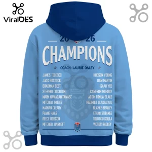 Light blue NSW Blues rugby hoodie featuring 2026 Champions text, Laurie Daley, and player names on the back.!