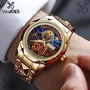 Gold wristwatch featuring an Iron Maiden 50th Anniversary graphic dial with Eddie mascot, on a gold link bracelet.!