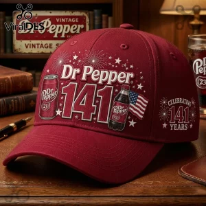 Dr Pepper 141st Anniversary Burgundy Baseball Cap featuring a soda can, bottle, US flag, and star accents on the front.