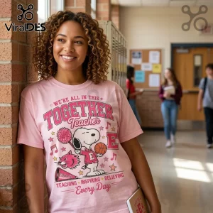Snoopy x High School Musical Together Teacher Pink T-Shirt featuring Snoopy with a basketball, pom-pom, and Wildcats logo.