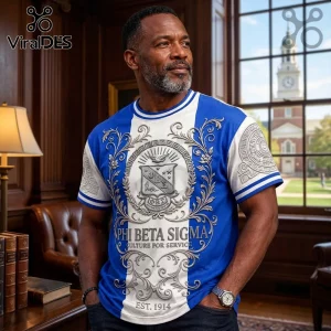 Middle-aged man wearing a blue and white Phi Beta Sigma t-shirt with embossed fraternity crest, scrollwork, and text.!