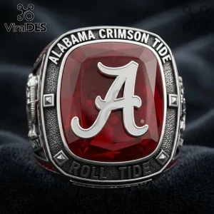 Alabama Crimson Tide Logo Red Stone Championship Ring featuring a large red gem, silver metal band, and text engravings.