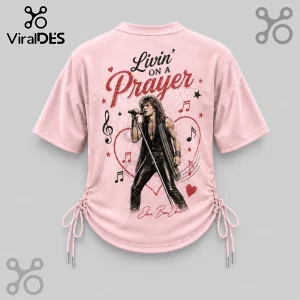 Bon Jovi Livin On A Prayer Pink Lace-Up Jersey featuring a graphic of Jon Bon Jovi, heart motifs, and musical notes.