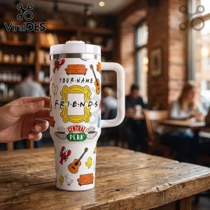 White stainless steel tumbler with Friends TV show pattern, yellow peephole frame, Central Perk logo, and handle.!