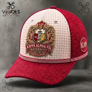 Kappa Alpha Psi baseball cap in crimson and cream with an ornate embroidered crest and Greek lettering on a textured base.!