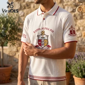 Kappa Alpha Psi polo shirt in white cotton with red trim, crest embroidery, Greek columns, and 1911 on the sleeve.!