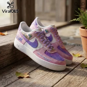 Custom pink and purple gradient sneakers with Air branding, floral graphics, and Can We Hang Out text on wood surface.!
