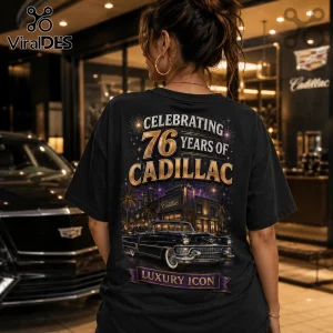 Black t-shirt featuring 76 years of Cadillac text, a classic car graphic, fireworks, and Luxury Icon banner on the back.!