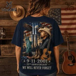 Toby Keith 9/11 25th Anniversary T-Shirt showing a bald eagle, Statue of Liberty, twin towers, and acoustic guitar graphic.