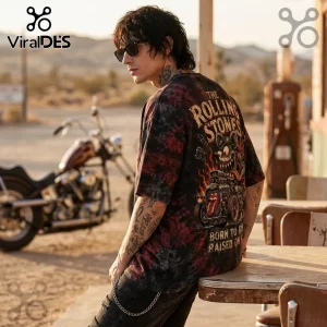 Man wearing a black and red tie-dye t-shirt with Rolling Stones graphic featuring a hot rod and character illustration.!