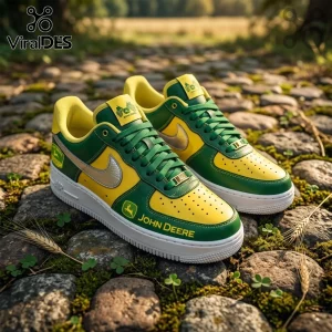 John Deere themed leather sneakers in yellow and green with silver swoosh, sitting on a cobblestone path.!
