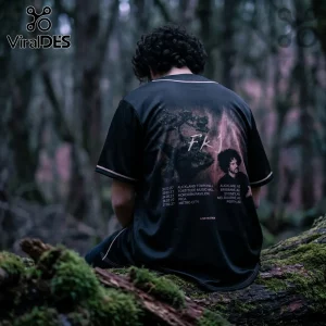 Black FKJ concert tour baseball jersey with back print featuring artist portrait, tour dates, and venues in a forest.!