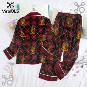 Gryffindor pajama set with maroon and black argyle pattern, featuring repeating gold lion house crests and white piping.!