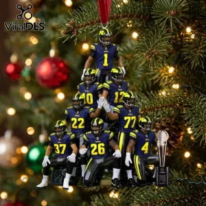 Michigan football player Christmas tree ornament featuring a stacked team pyramid with a championship trophy replica.!