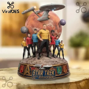 Star Trek 60th anniversary figurine featuring Captain Kirk and original crew standing on a cratered planet surface base.!