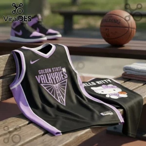 Golden State Valkyries x Hello Kitty black basketball jersey with purple trim and screen-printed graphics on a bench.