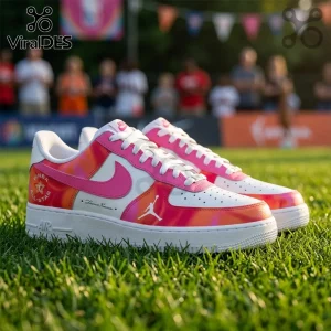 WNBA All-Star 2026 Pink Nike Air Force 1 sneakers with tie-dye patterns, white midsoles, and basketball court background.