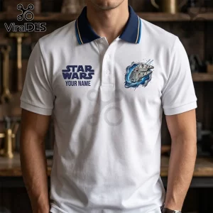 White polo shirt with blue collar, Star Wars logo, and Millennium Falcon graphic on the chest.!