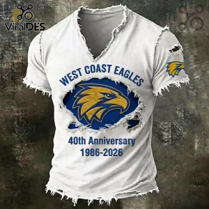 White V-neck t-shirt with distressed edges featuring West Coast Eagles logo and 40th anniversary 1986-2026 text graphics.!