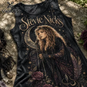 Black tank top featuring a graphic of Stevie Nicks with a crescent moon, stars, roses, and feathers in metallic gold tones.!