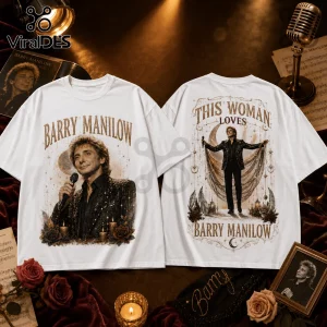 White graphic t-shirt featuring Barry Manilow portraits, star motifs, and the text This Woman Loves Barry Manilow.!