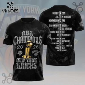 Black New York Knicks 2026 NBA Champions graphic t-shirt with gold trophy, team roster on back, and smoke pattern.!