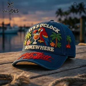 Jimmy Buffett It Is 5 OClock Somewhere baseball cap with parrot, cocktail, and palm tree embroidery on a blue denim crown.