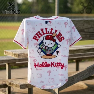 White Philadelphia Phillies Hello Kitty baseball jersey featuring red text and character patterns on a wooden bench.!